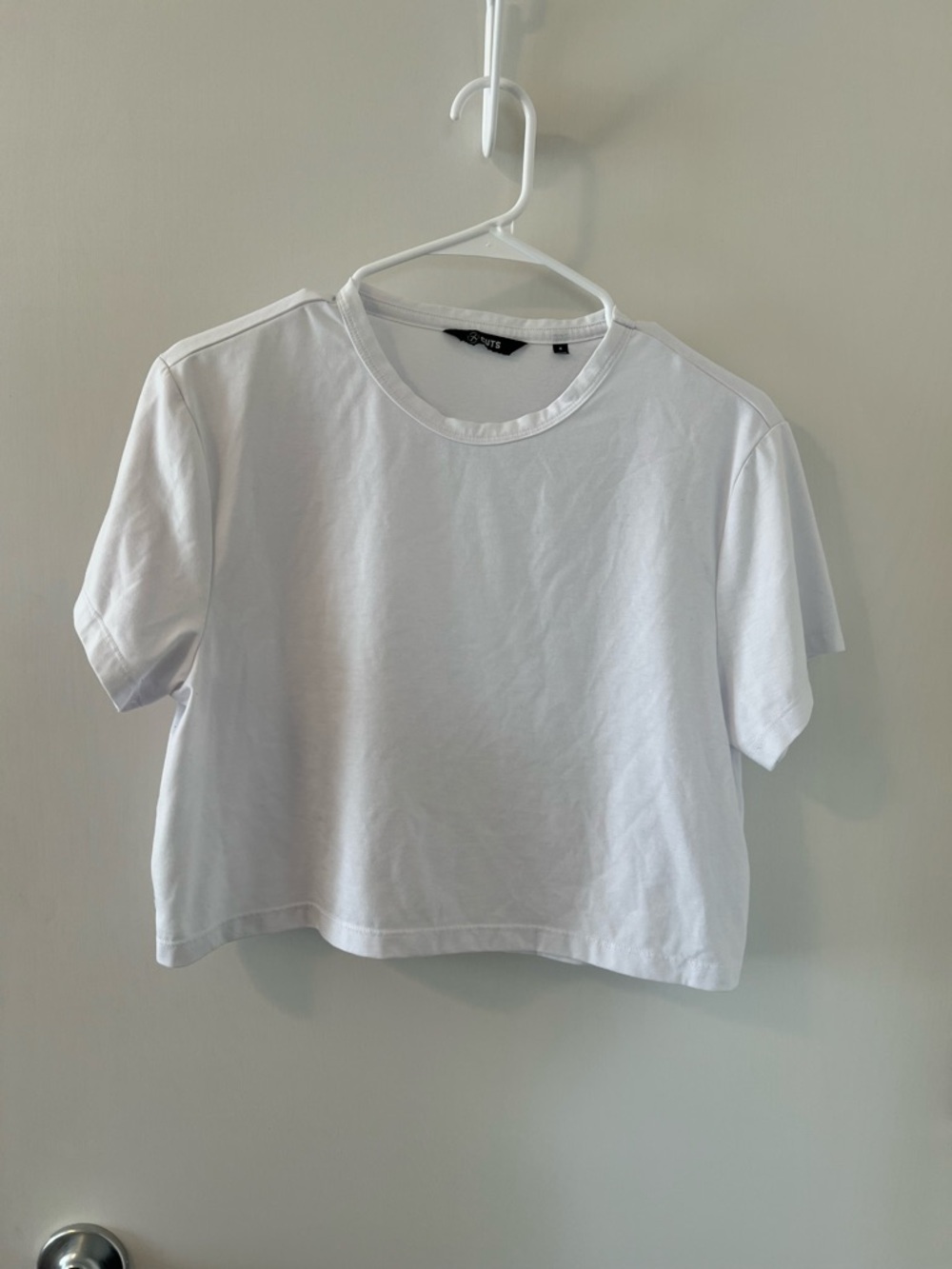 Cuts clothing almost Friday tee